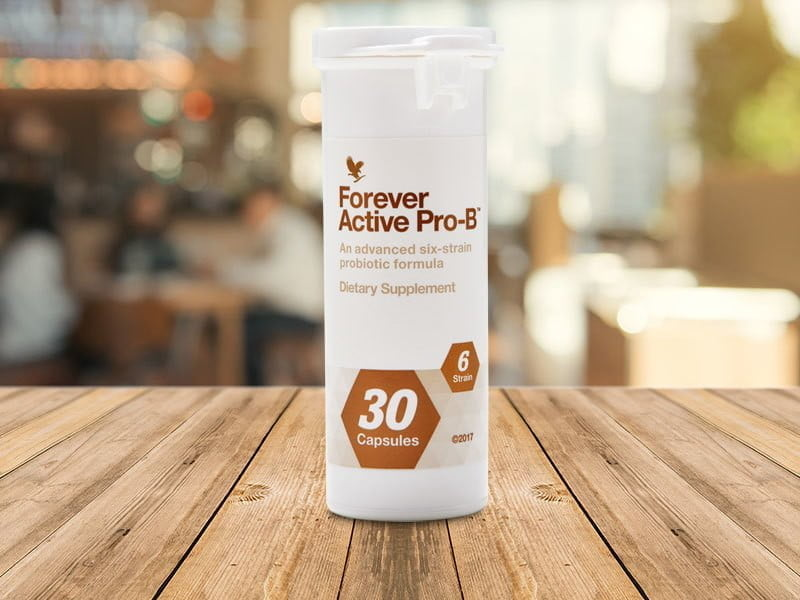 Een potje probiotica capsules voor het herstellen van de darmflora na een antibioticakuur, aanbevolen door een voedingscoach